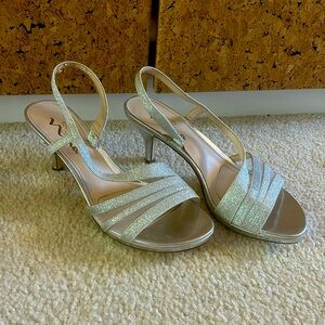 Touch of Nina, sliver and cream heel